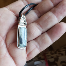 Load image into Gallery viewer, This Fossil Mammoth Tooth Necklace is about 1.5&quot; in length and set in Handmade sterling silver.&nbsp; It has flaws, as I am still learning silversmithing. Fossil Mammoth Tooth is from Siberia.&nbsp;
