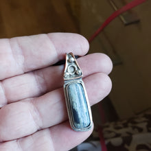 Load image into Gallery viewer, This Fossil Mammoth Tooth Necklace is about 1.5&quot; in length and set in Handmade sterling silver.&nbsp; It has flaws, as I am still learning silversmithing. Fossil Mammoth Tooth is from Siberia.&nbsp;
