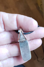 Load image into Gallery viewer, This Fossil Mammoth Tooth Necklace is about 1.5&quot; in length and set in Handmade sterling silver.&nbsp; It has flaws, as I am still learning silversmithing. Fossil Mammoth Tooth is from Siberia.&nbsp;
