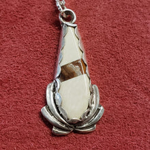 Load image into Gallery viewer, This pendant has been handcrafted from .925 Sterling Silver, and White Fossil Mammoth Ivory found in Alaska and Gold Fossil Mammoth Tooth found in Siberia. This pendant has been handcrafted from Sterling Silver by me.
