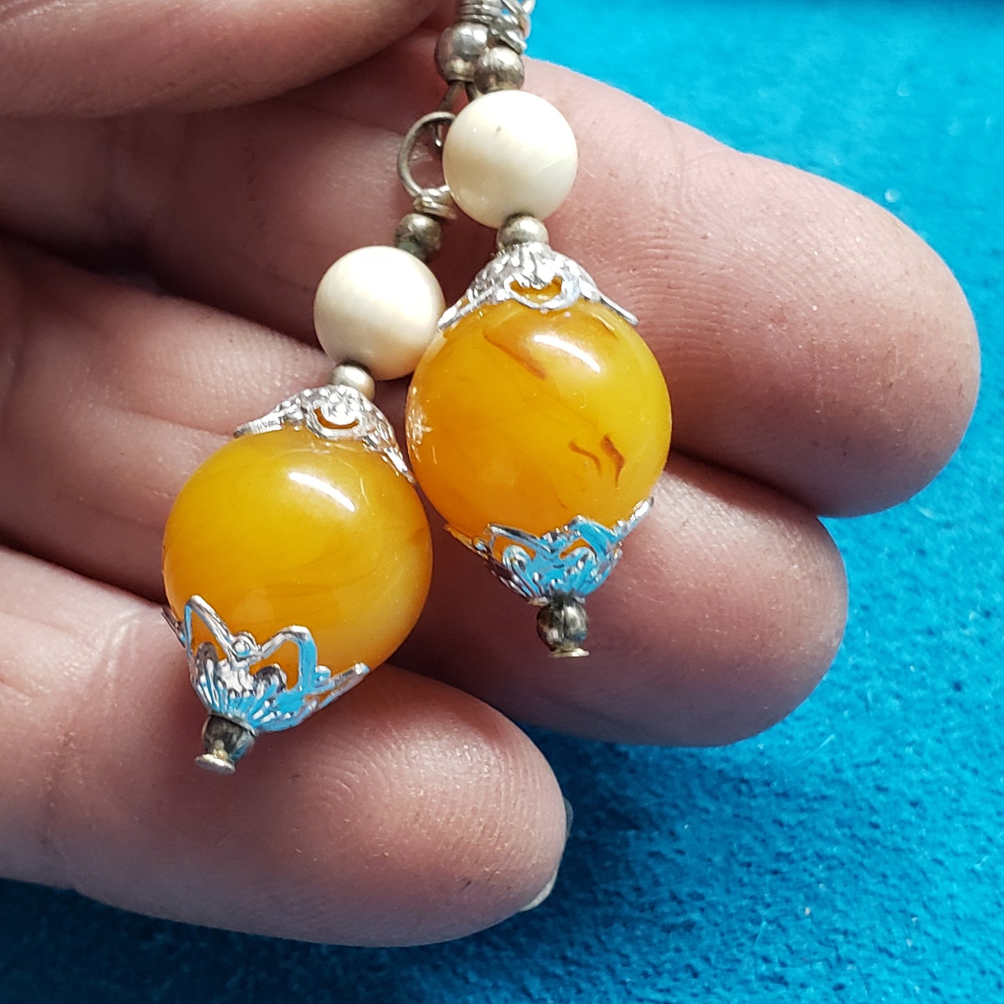 Baltic Amber and Mammoth Ivory Bead Earrings on sale.