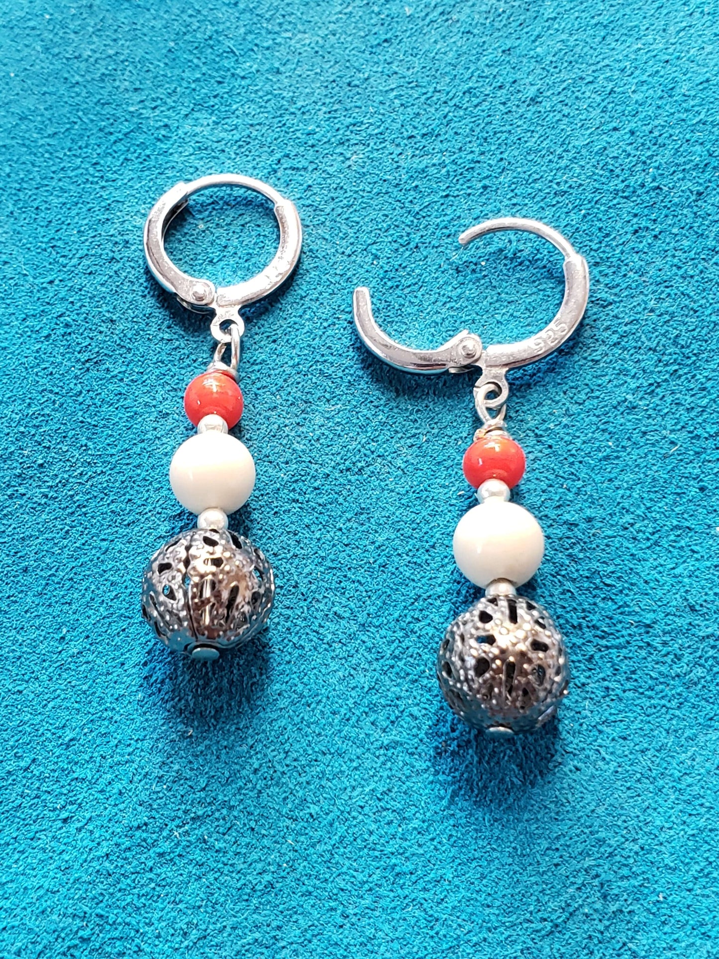 These 1" long Sterling Silver, Fossil Mammoth Ivory bead earrings are highlighted with Antique Red Native American trade beads. 