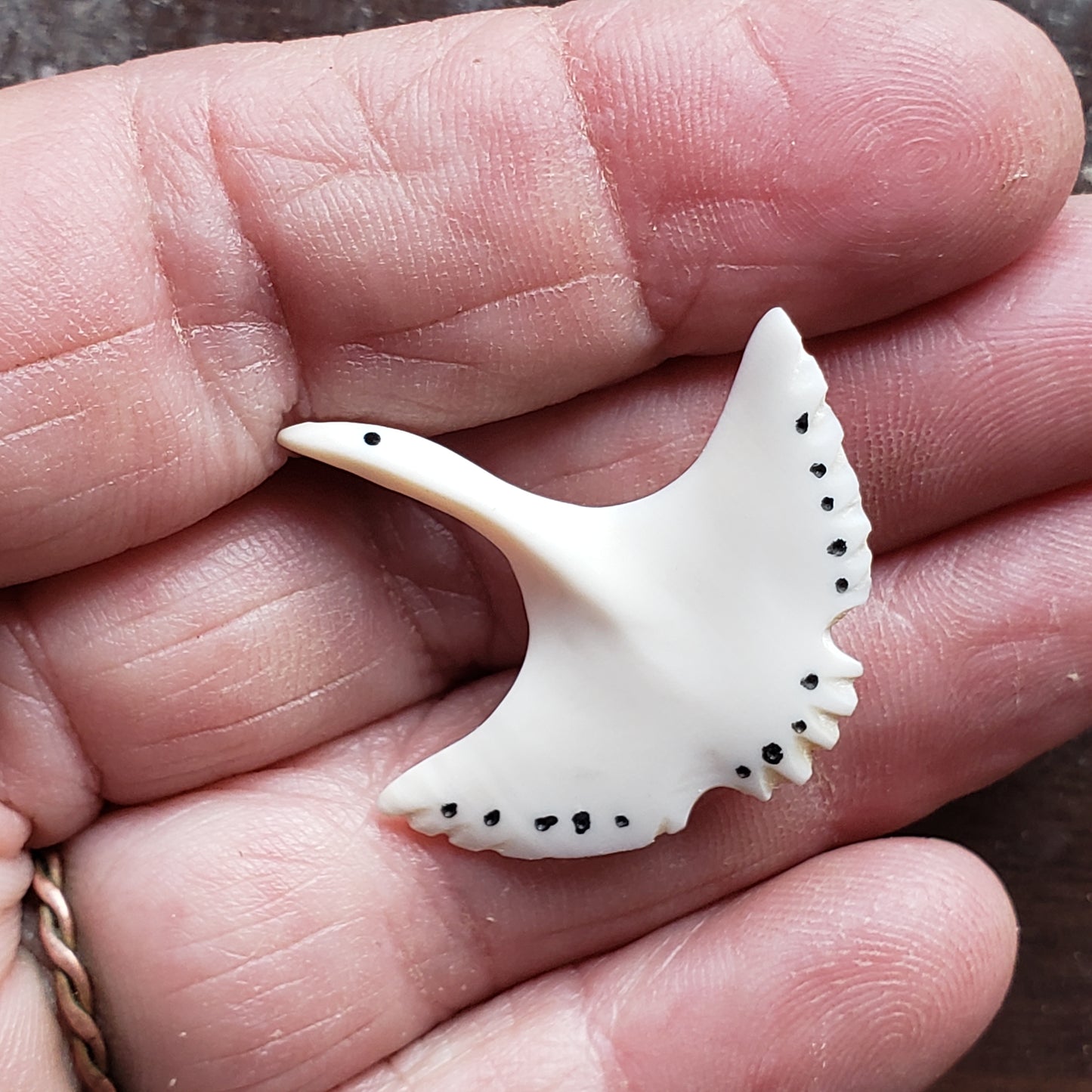 This gorgeous hand carved Tie Tack has been crafted from Fossil Walrus Ivory by an unknown Alaskan artist sometime in the 1950s or sixties. 